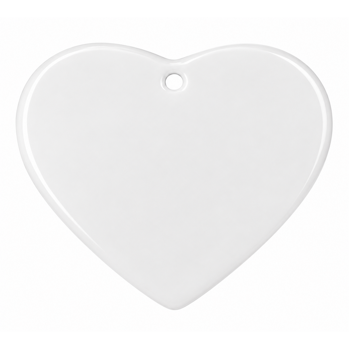 A blank white ceramic heart-shaped ornament with a small hanging hole at the top, shown on a clean white background.