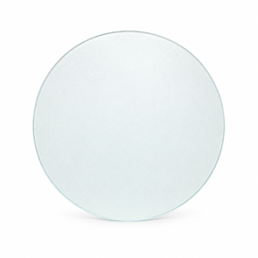 A round, textured clear glass plate or platter shown from a top-down view on a clean white background.
