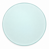 A round, clear glass plate with a subtle light blue tint, shown from a top-down perspective on a white background.