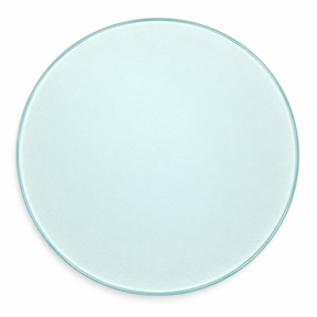 A round, clear glass plate with a subtle light blue tint, shown from a top-down perspective on a white background.